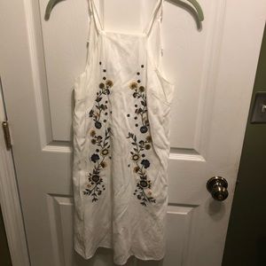 White dress with flower details